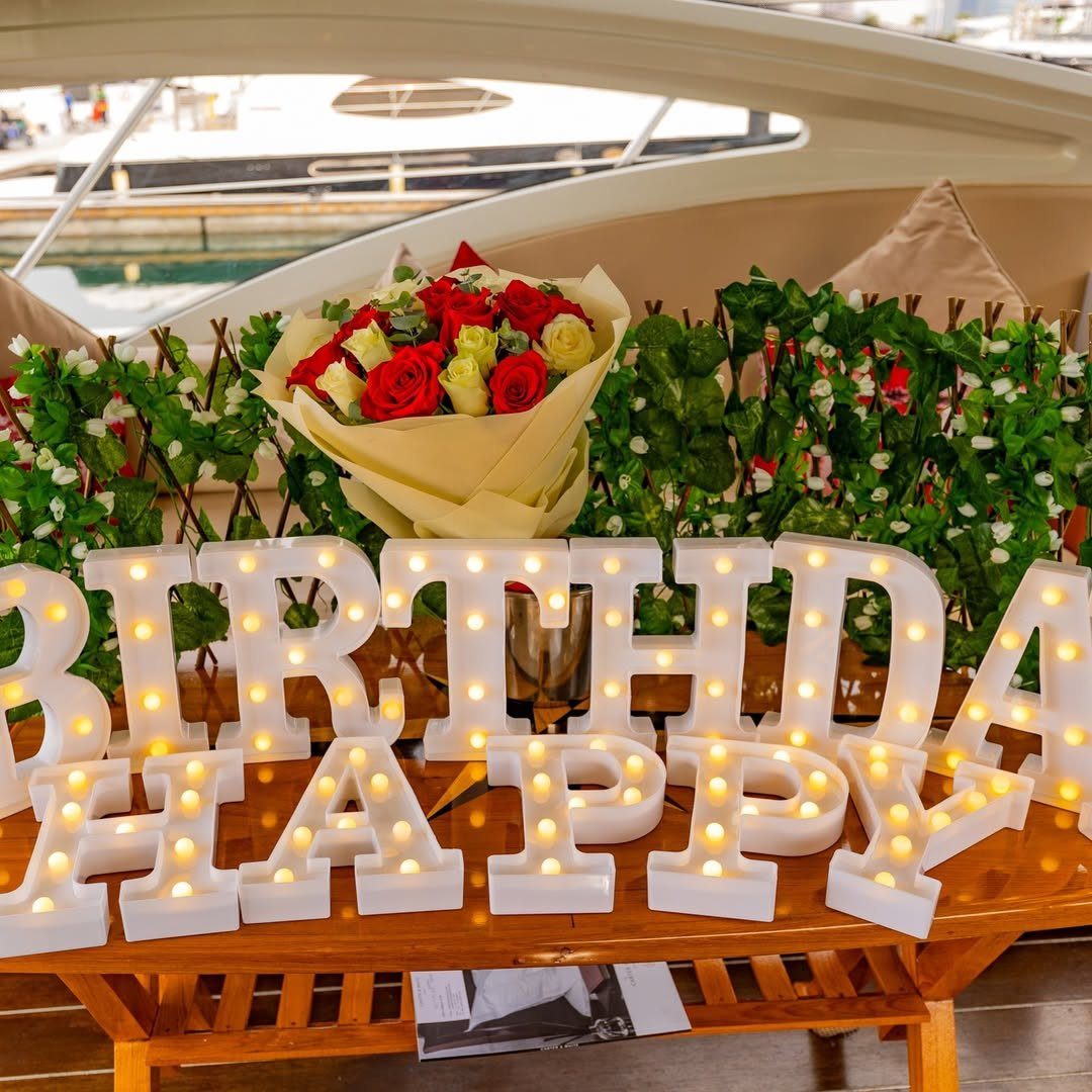 Pink balloon ceiling decoration for a birthday yacht party