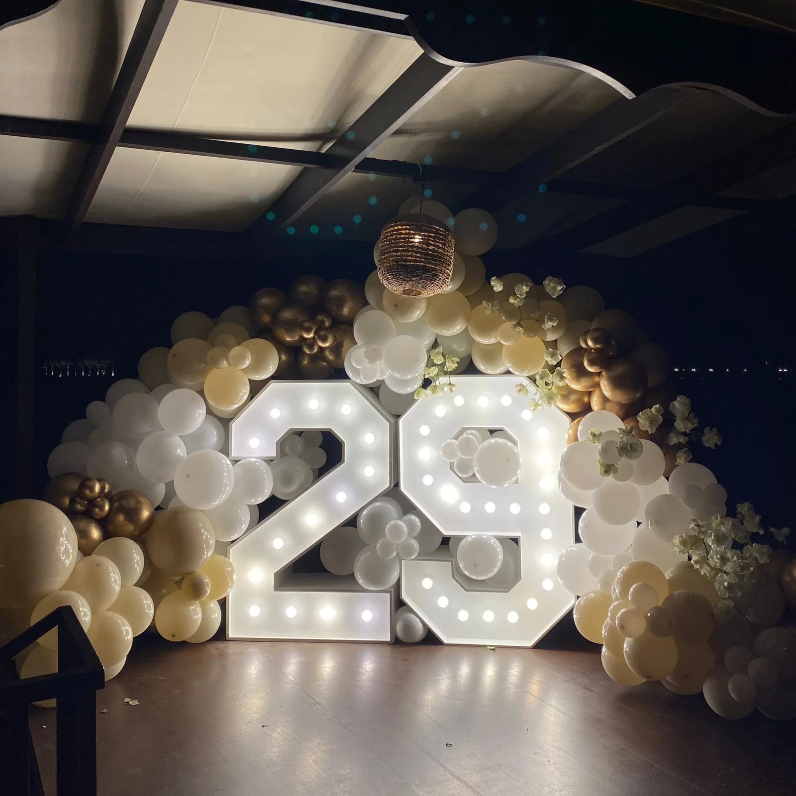 Light-up birthday number decoration on a yacht