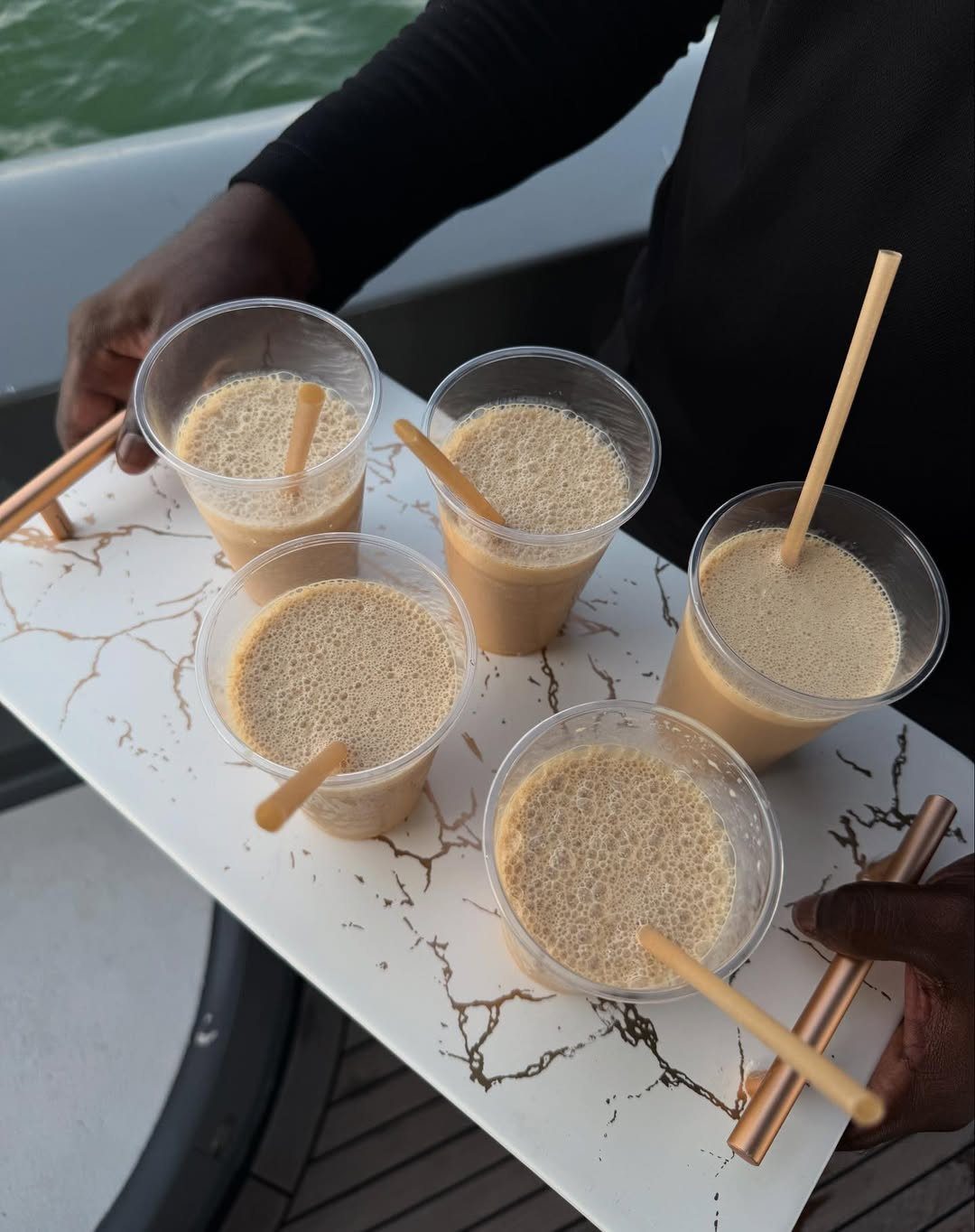 Drinks service on board during a corporate yacht event