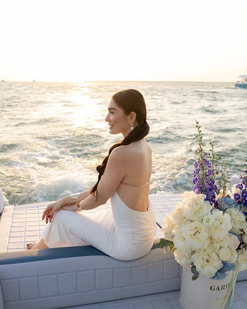 Romantic golden hour moment on a yacht deck